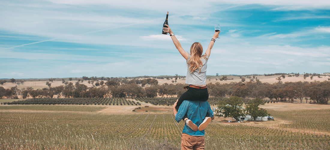 Couple in the Wren Vineyard, woman on man's shoulders